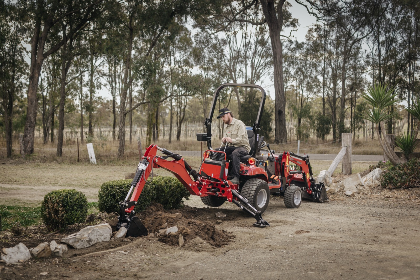 Case IH compact tractor working on farm