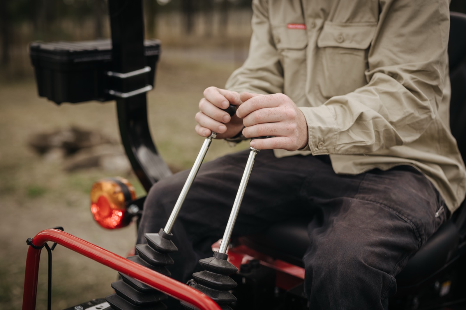 Case IH compact tractor working on farm