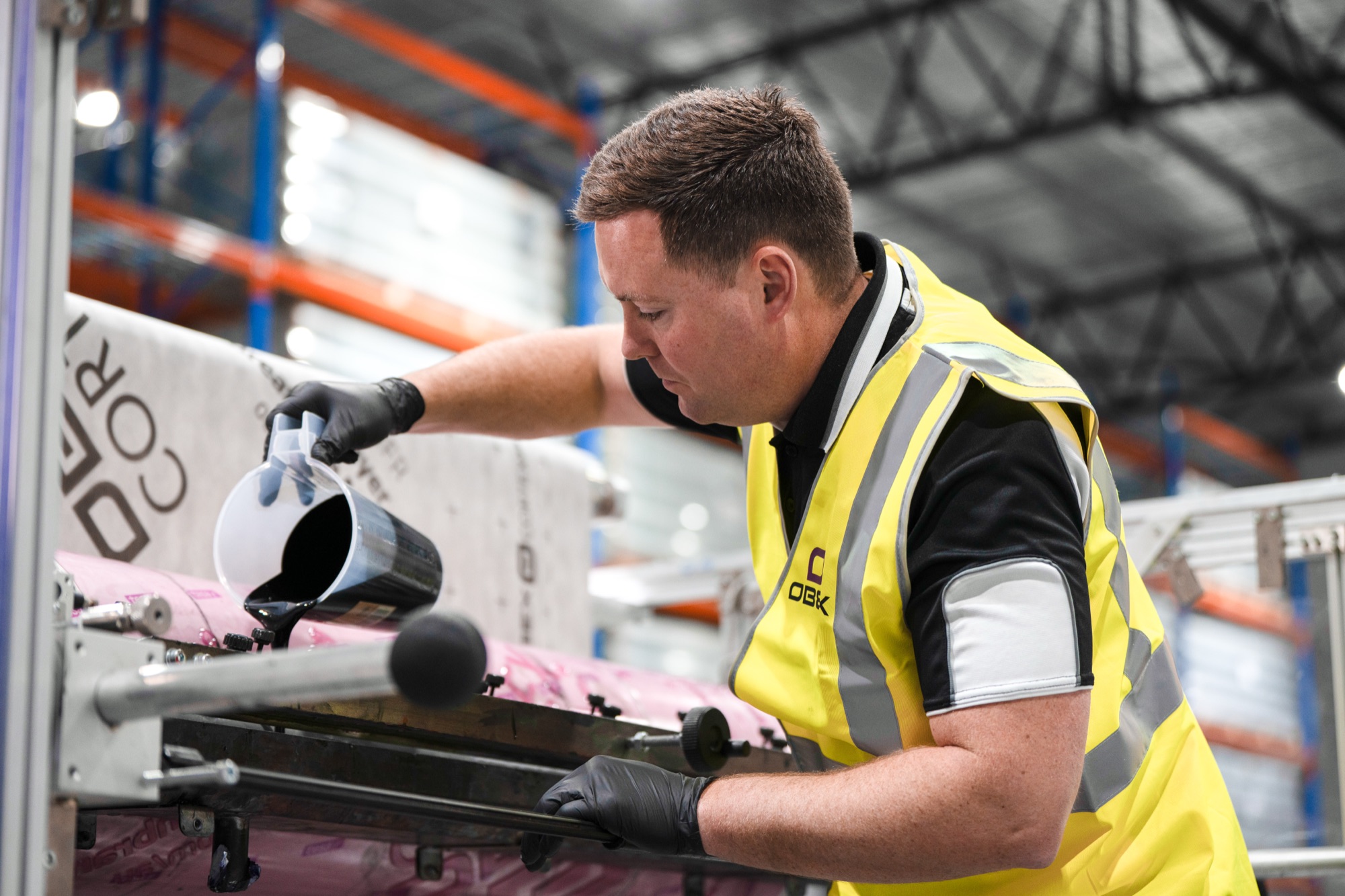 Obex operator working on the production line