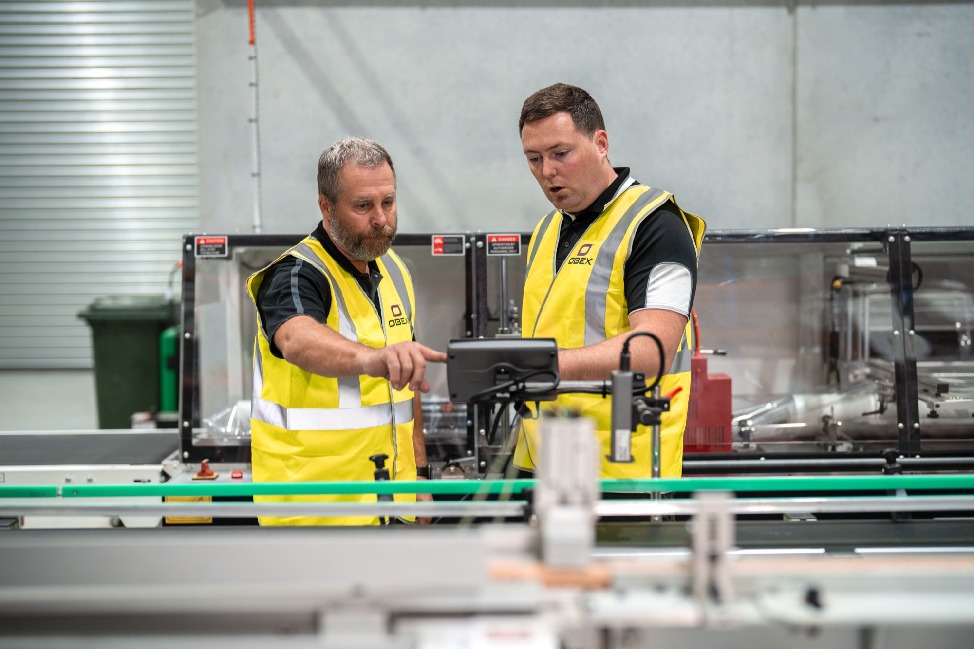 Obex team working the production line